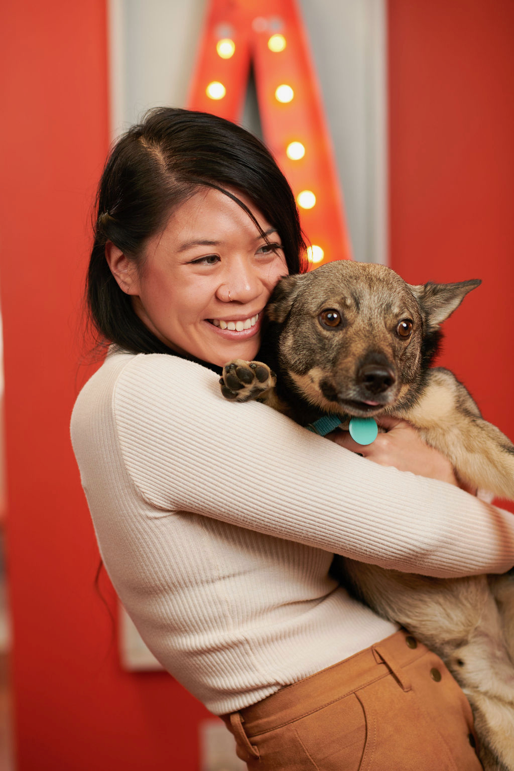 Tiffany Choi smiling with her dog